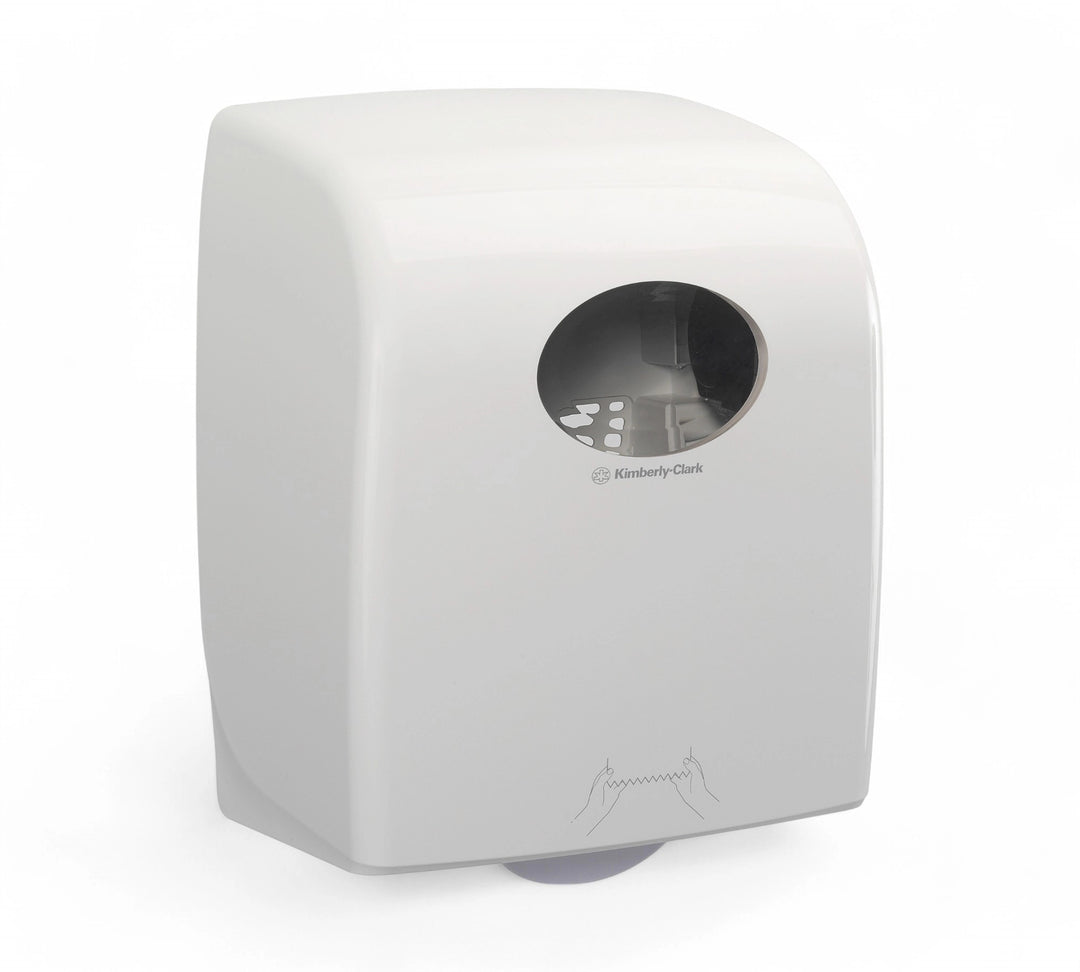 Front-facing view of a Kimberly-Clark Aquarius paper towel dispenser with a transparent window showing the roll inside and tear guide illustration printed on the front.
