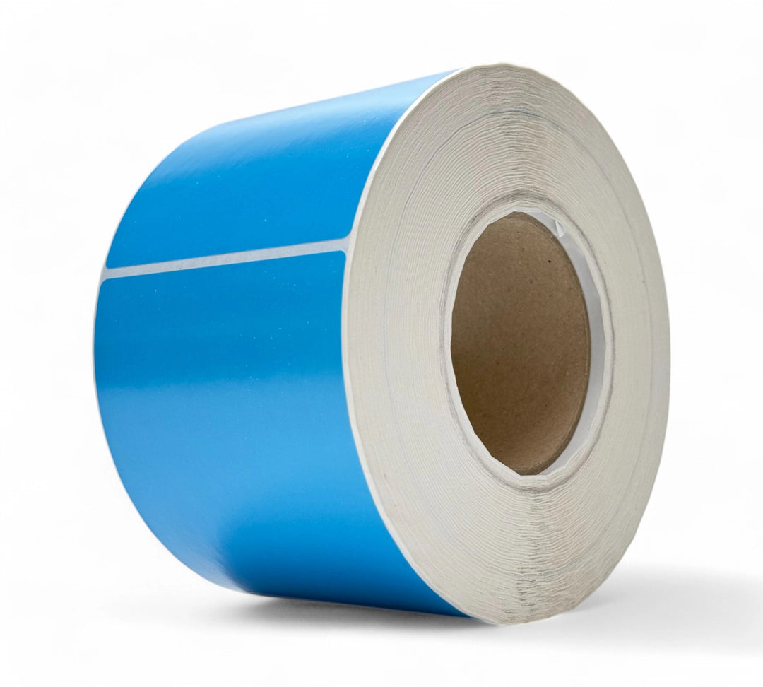 Blue 103 x 124mm thermal transfer label rolls shown neatly stacked for product colour coding and barcode systems