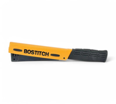 Bostitch H30-8 hammer tacker displayed side view with ergonomic grip for stapling insulation or packaging wrap