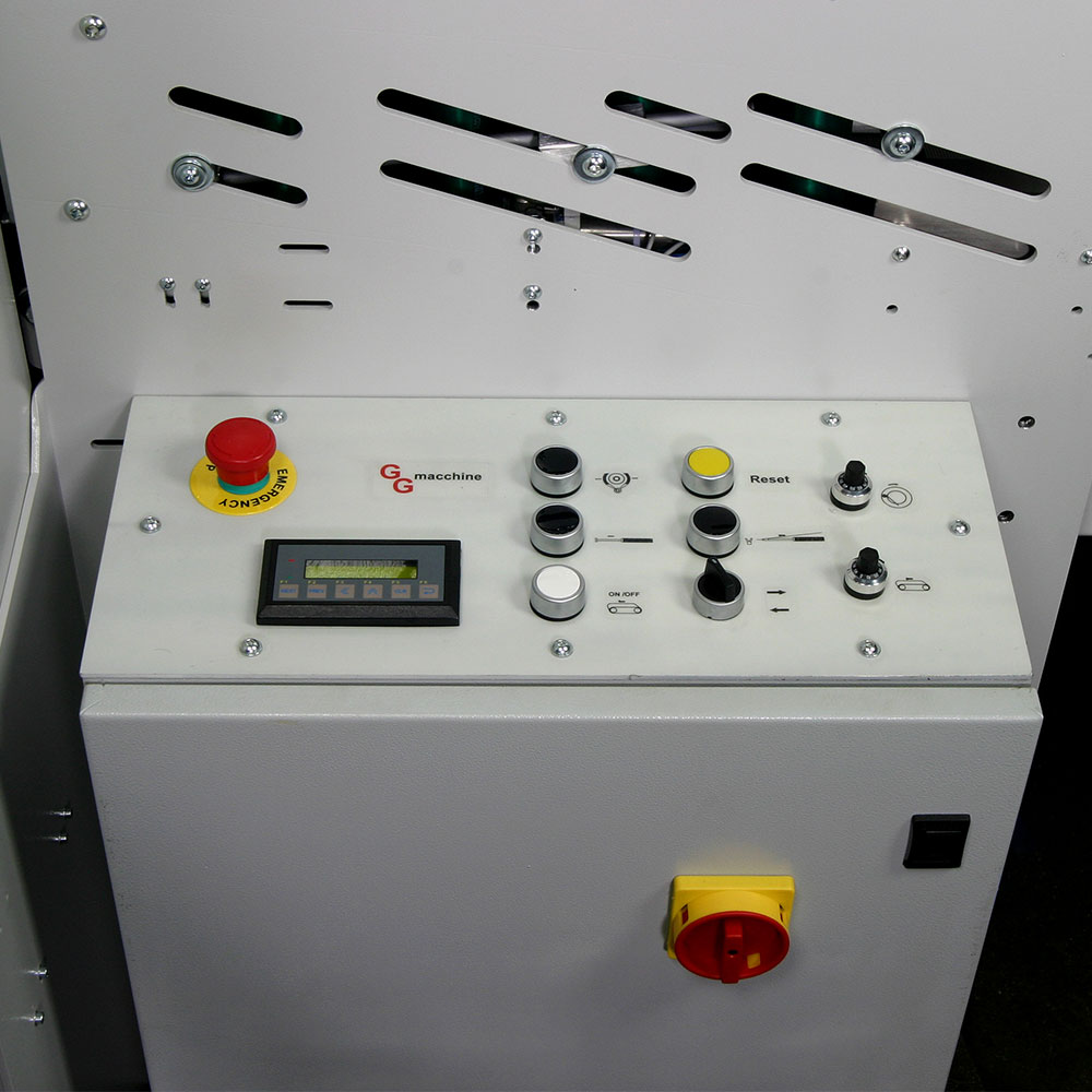 Control panel for semi automatic horizontal wrapping machine featuring emergency stop, reset, and precision cycle adjustment knobs for secure packaging operations