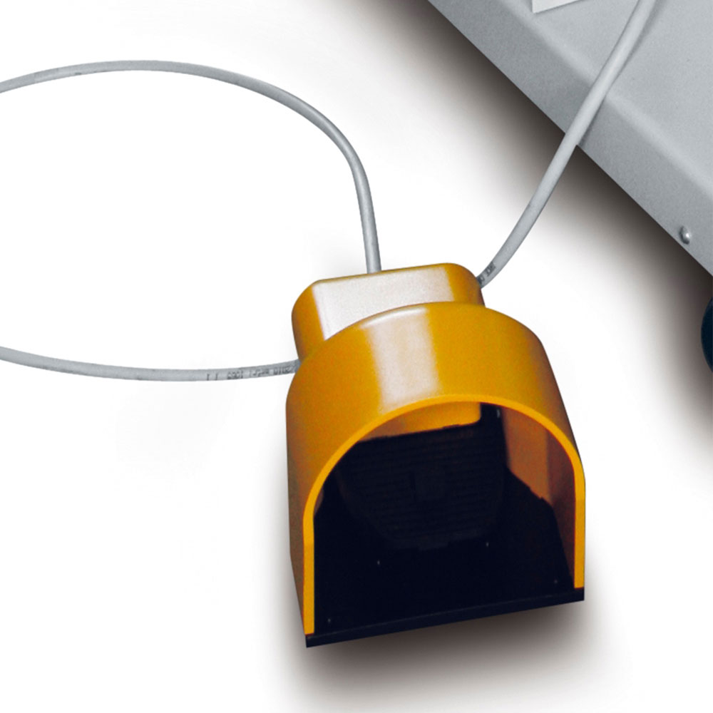 Heavy-duty foot pedal controller with protective yellow cover for semi-automatic wrapping operation
