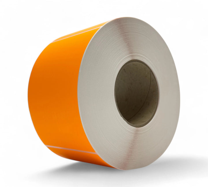 Bright fluro orange 100 x 150mm thermal transfer labels coiled in rolls ideal for visibility in logistics and retail