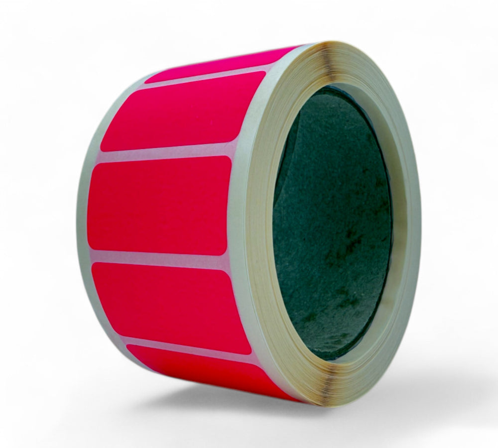 Fluro pink 50 x 25mm label rolls shown bundled for colour-coded identification in warehouse or retail applications