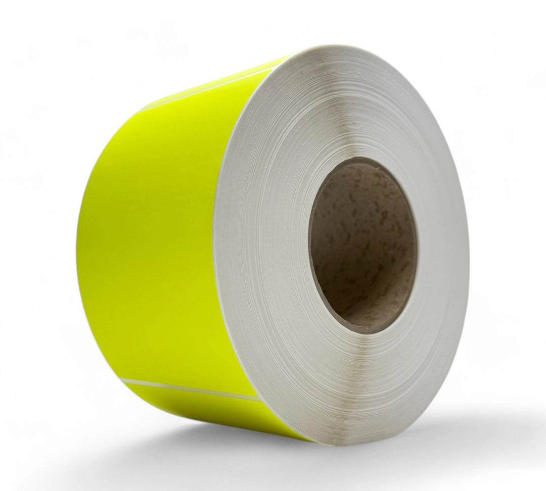 Fluro yellow 100 x 150mm thermal labels with perforation displayed in compact rolls for high-speed thermal printers