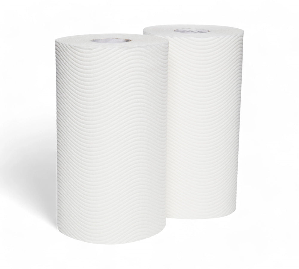 Two rolls of white KLEENEX VIVA kitchen towel with signature wave texture, standing upright on a plain background