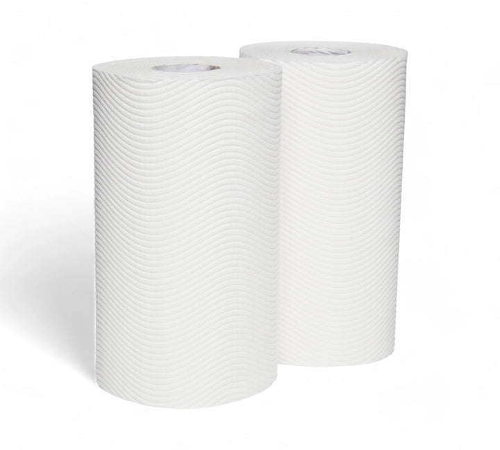 Two rolls of white KLEENEX VIVA kitchen towel with signature wave texture, standing upright on a plain background