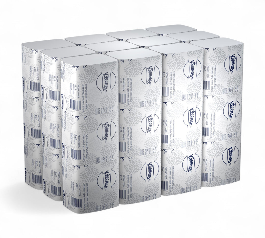 Bulk stacked view of KLEENEX Soft Interleaved Toilet Tissue (4322), displaying individually wrapped packs with branded grey and white floral pattern, arranged for visualising full carton quantity.
