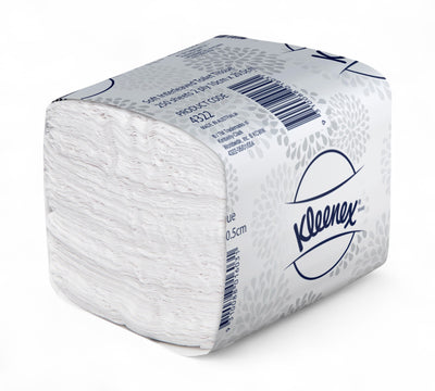 KLEENEX soft interleaved toilet tissue displayed in soft white packs for premium comfort and reduced usage
