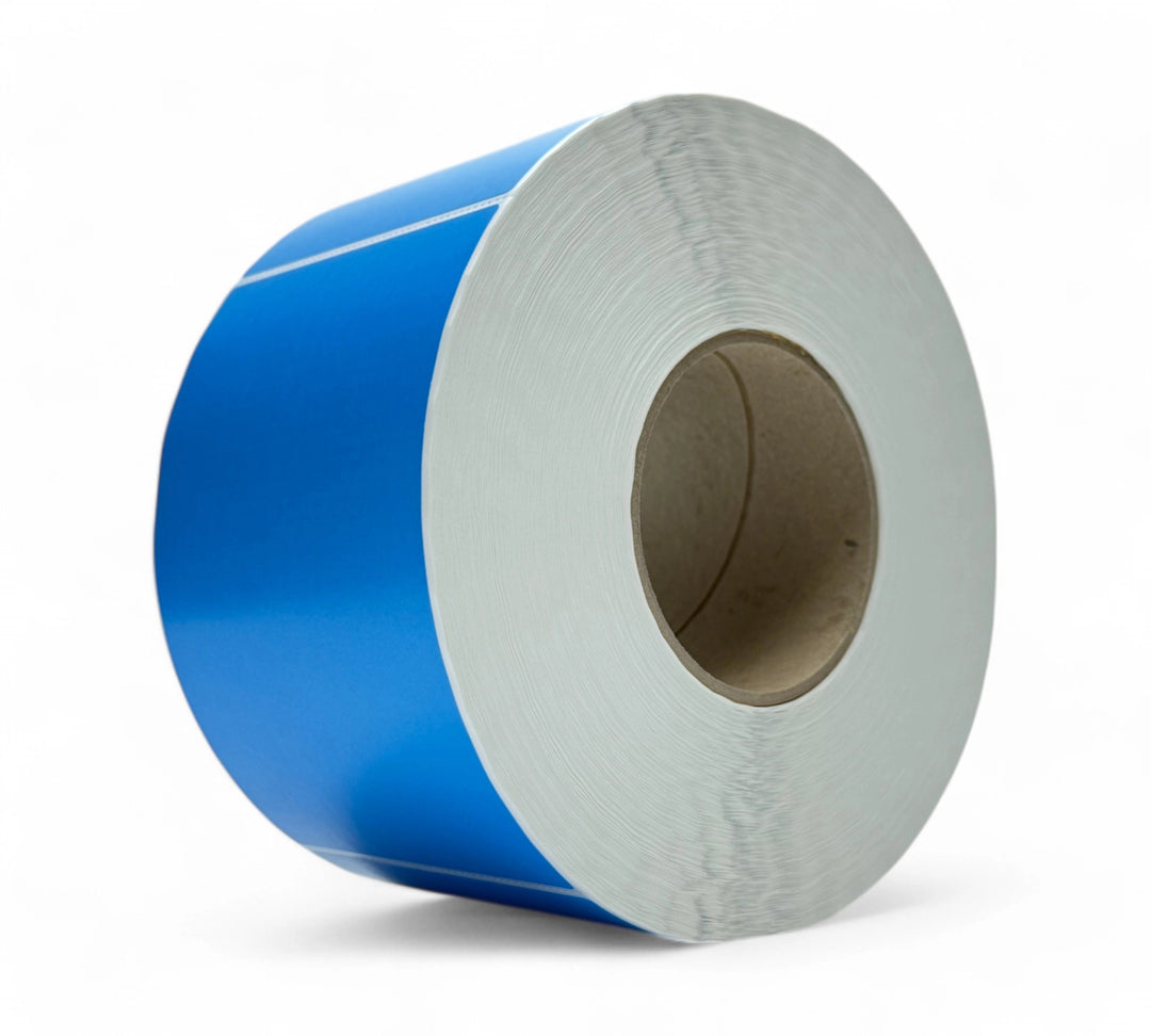 Light blue thermal transfer labels 100 x 150mm perforated displayed in rolls for carton or inventory labelling