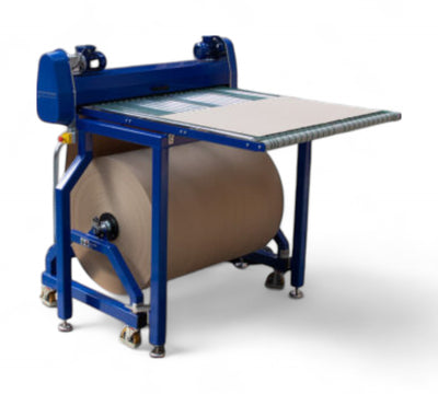 Palcut 1200 wide-format automated slip sheet dispenser used in high-volume packaging lines  -  RMA Packaging