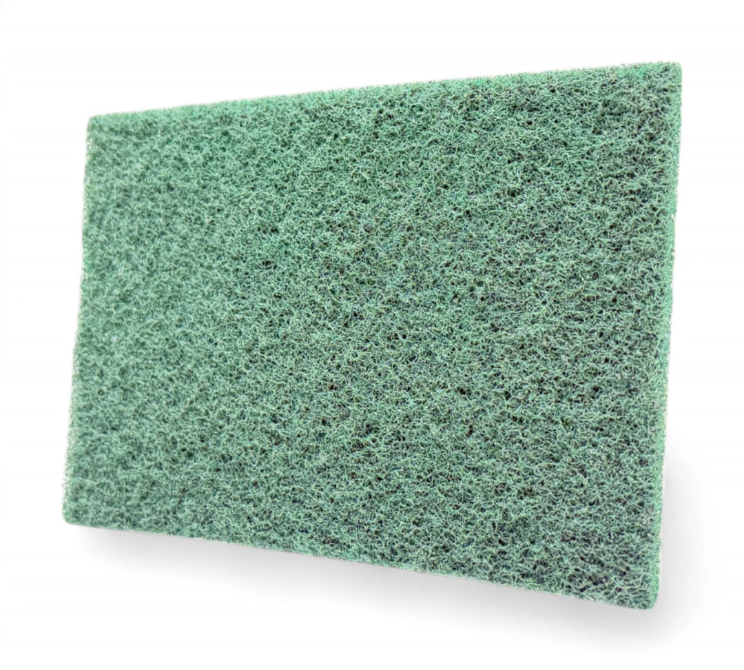 Q96 green scourer pad 150 x 230mm shown stacked for scrubbing cookware, surfaces, and equipment