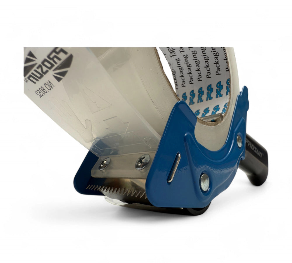 Close-up of 48mm 'Rat Trap' pistol grip tape dispenser blade with safety shield and serrated cutter for precision sealing