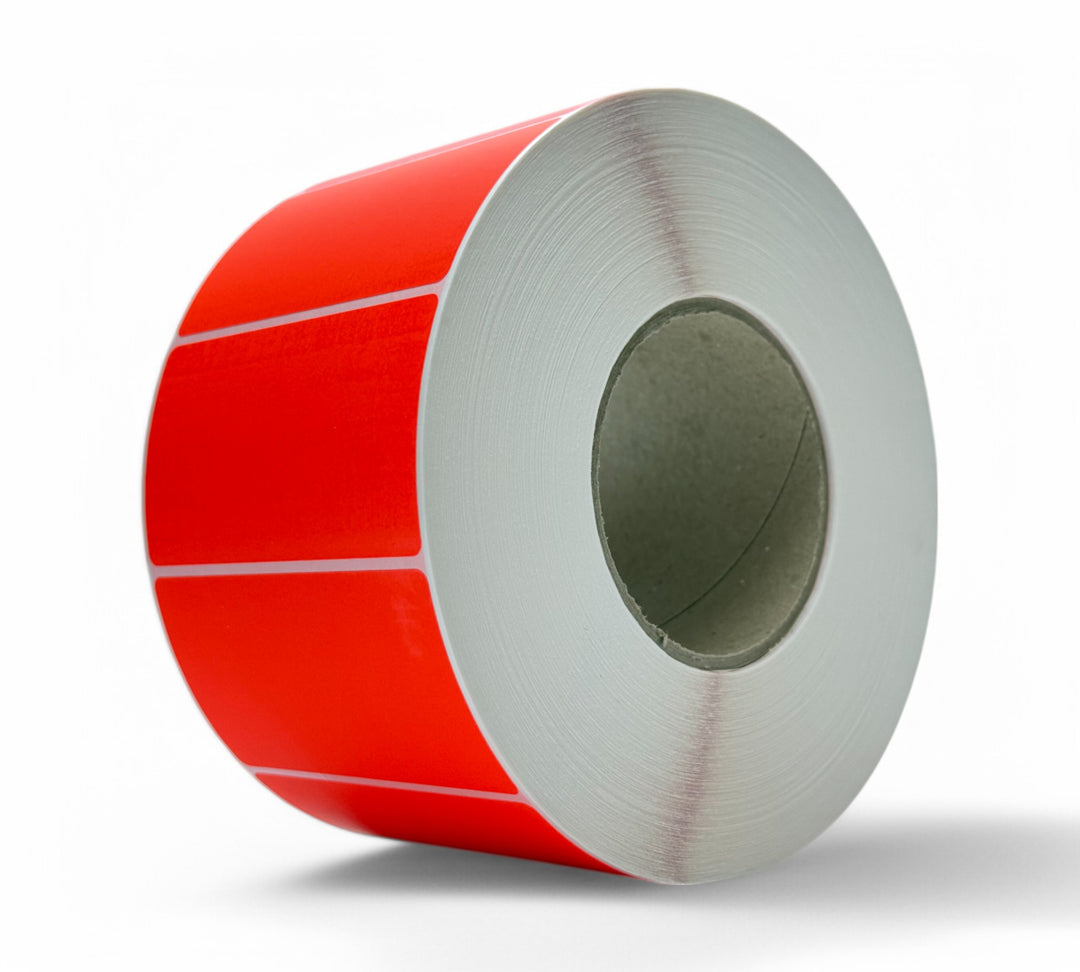 Red 94 x 51mm thermal transfer label rolls in high volume designed for urgent tagging and inventory systems