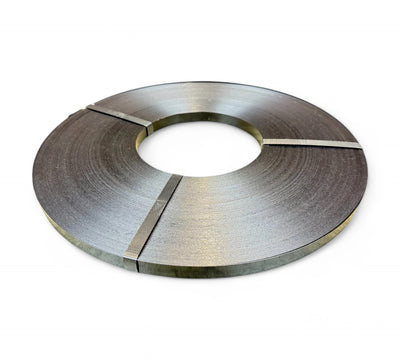 Ribbon wound steel strap 12.7mm x 0.5 shown coiled for heavy-duty bundling of industrial loads