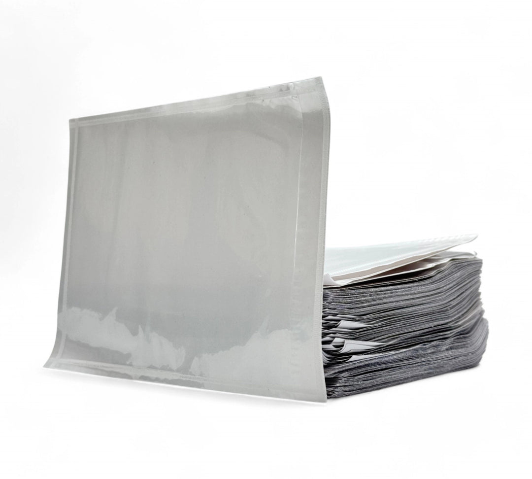 115 x 150mm plain white adhesive envelopes in rolls for document inclusion during packaging and shipping