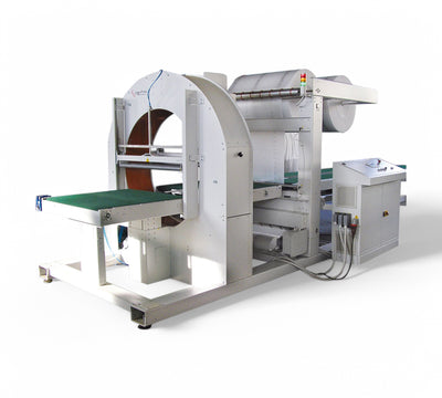TC ST Total Close fully automatic horizontal wrapping machine with dual film spool and integrated transverse welding for complete product encapsulation and industrial packaging protection