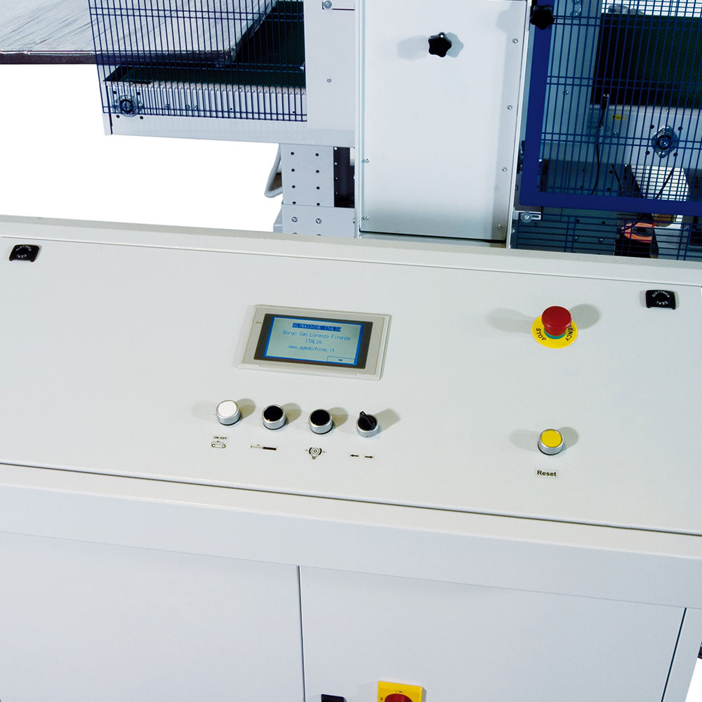 Control panel of TC ST Total Close automatic horizontal wrapping machine featuring touchscreen interface and emergency stop for precision packaging control