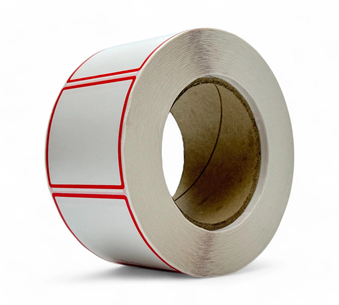 White 63 x 50mm thermal labels with red border shown in rolls with 76mm core for attention-grabbing price tags
