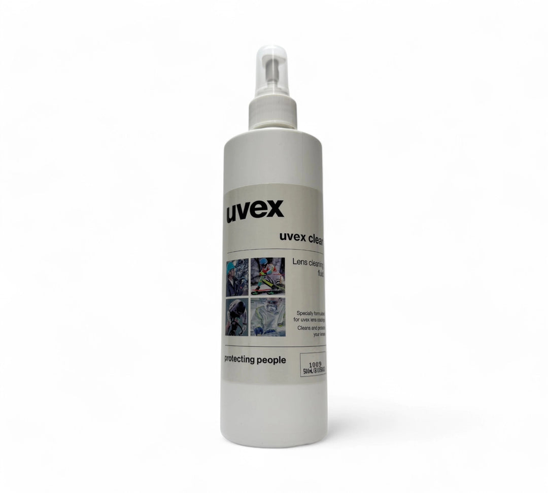 Uvex lens cleaner 500ml 1009 displayed in clear spray bottle for removing fog smudges or dust from safety glasses