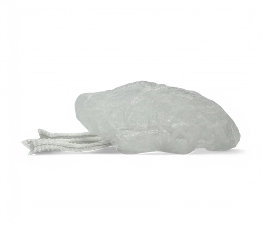White crinkled mop cap hair net displayed compressed for food production or cleanroom hygiene compliance