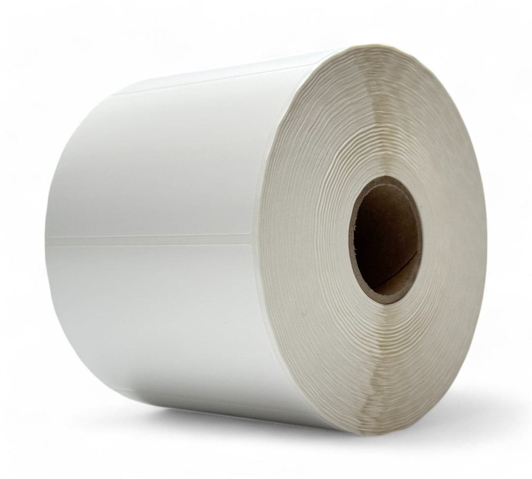 White 100 x 73mm direct thermal transfer labels displayed in rolls ideal for inventory, logistics, and shipping
