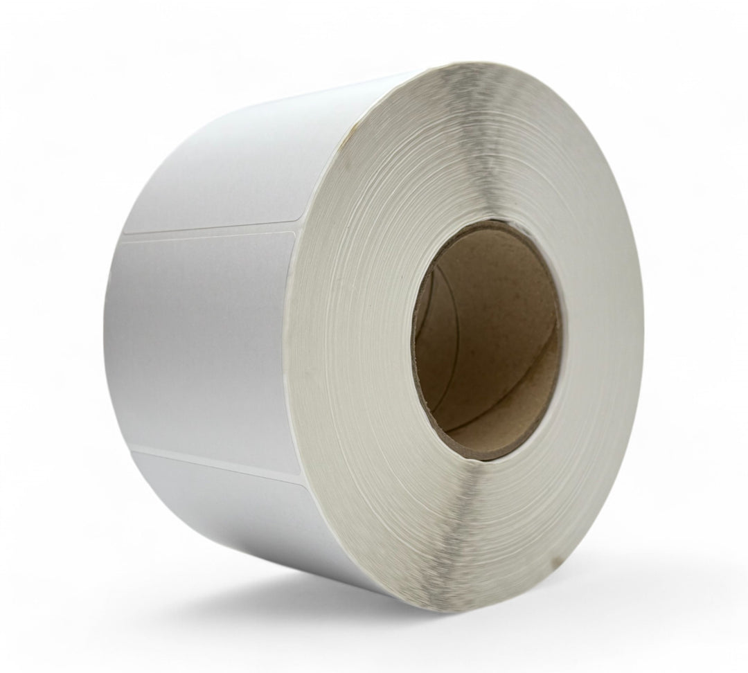 White 30 x 30mm thermal transfer labels with 76mm core displayed in bulk rolls for square barcode and product labelling