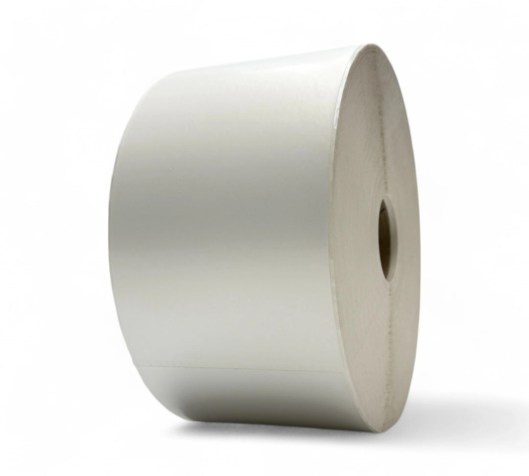 Wide-format 100 x 200mm white synthetic labels with 38mm core displayed in rolls for heavy-duty thermal printers